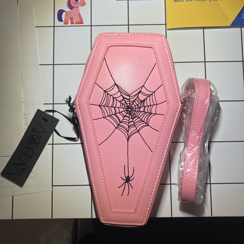 Dollskill Widow, small purse. New, hasn’t been used. With a strap